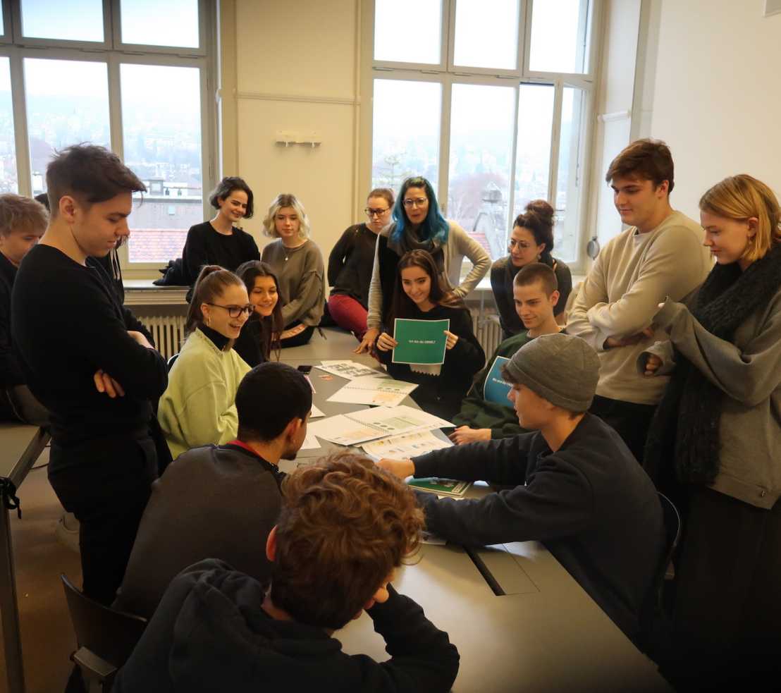 Students busy debating during Burger Game (Image: WFSC)