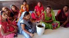 During a training: participants learn how to mix the homemade pesticide